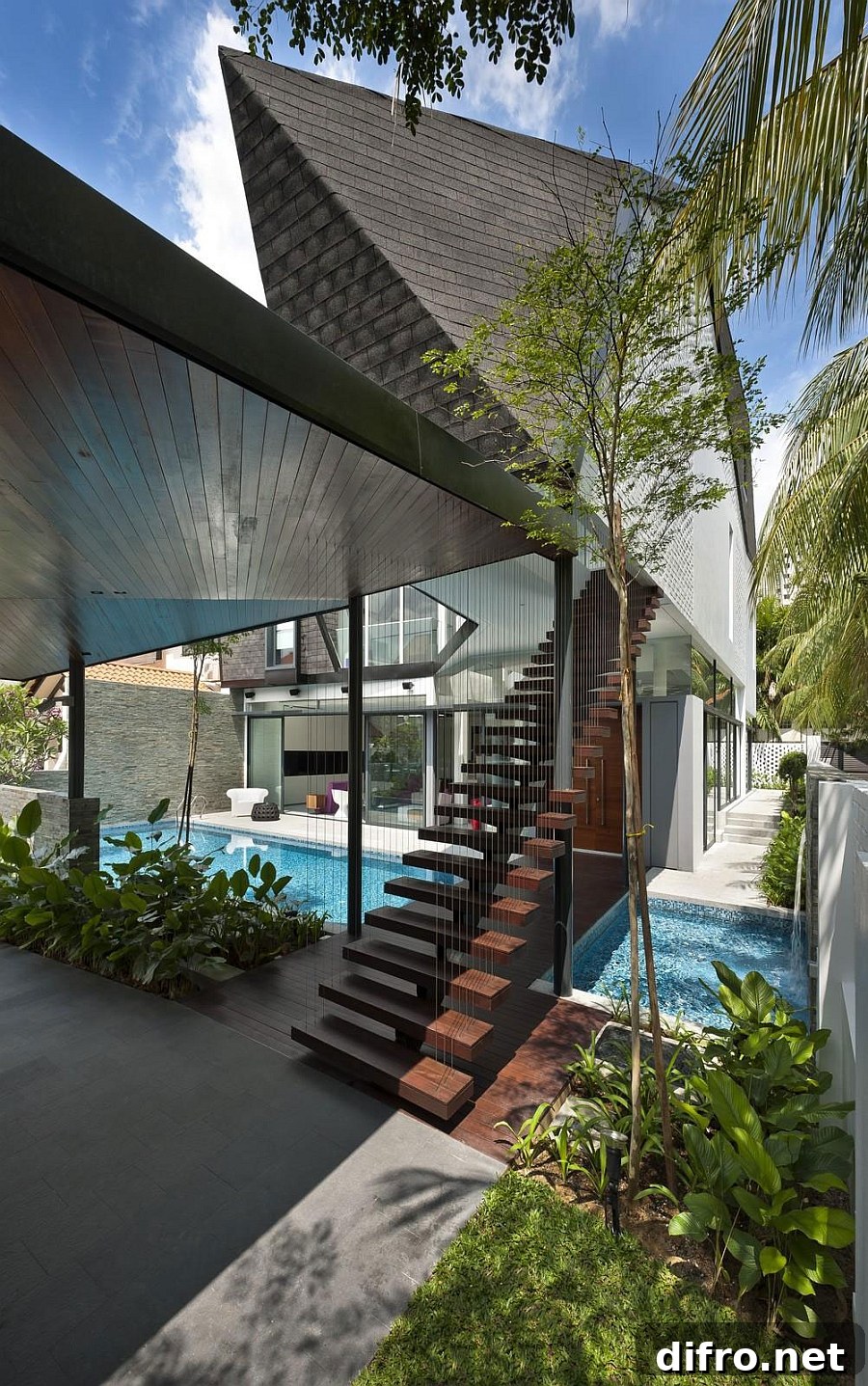 Floating staircase leading to the interior