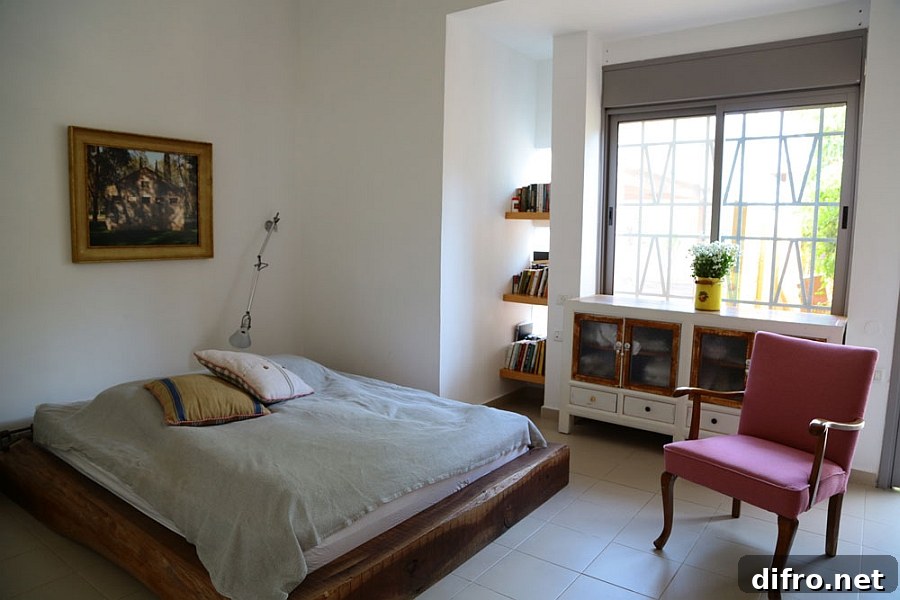 Lovely masterbedroom with a platform bed in solid wood